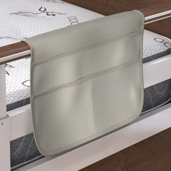 SonderCare rail organizer hanging on a bed rail with personal items